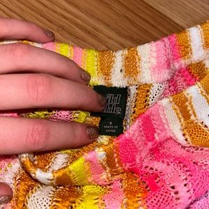 Very stylish, perfect for the beach as a swimsuit cover up.